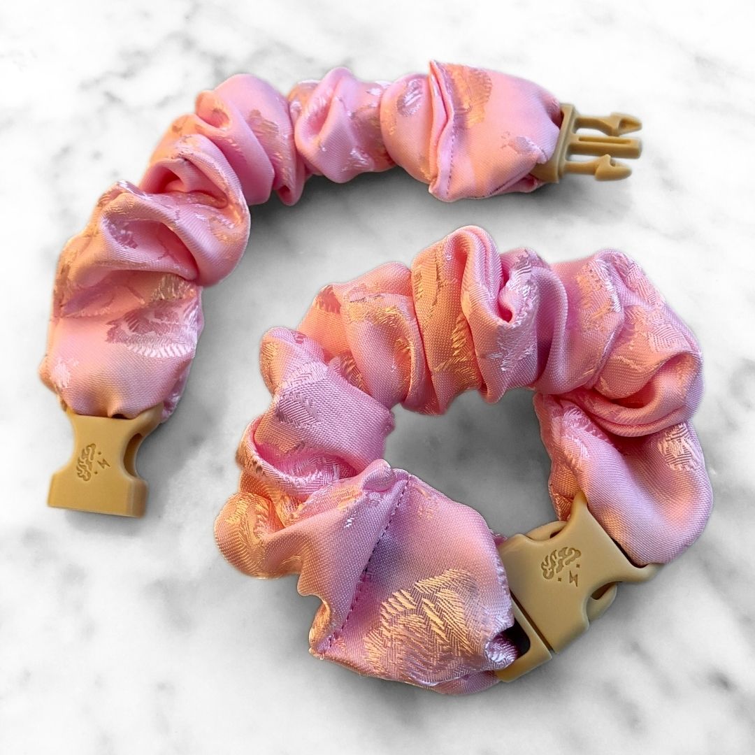 Best zero tangle no pull hair tie elastics and scrunchie hair accessories for snag-free, pull-free, rip-free, hair. Smooth, effortless hair ties and hair scrunchies for athletes, active moms, fitness, & sports. Empress Pink Buckle Scrunchie - Lunar New Year Áo Dài - No Snagging, No Tangles