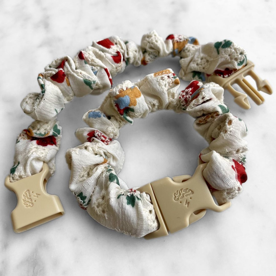 Best zero tangle no pull hair tie elastics and scrunchie hair accessories for snag-free, pull-free, rip-free, hair. Smooth, effortless hair ties and hair scrunchies for athletes, active moms, fitness, & sports. Poppy Oat MINI Buckle Scrunchie - No Snagging, No Tangles