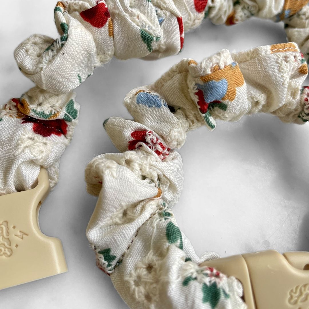 Best zero tangle no pull hair tie elastics and scrunchie hair accessories for snag-free, pull-free, rip-free, hair. Smooth, effortless hair ties and hair scrunchies for athletes, active moms, fitness, & sports. Poppy Oat MINI Buckle Scrunchie - No Snagging, No Tangles