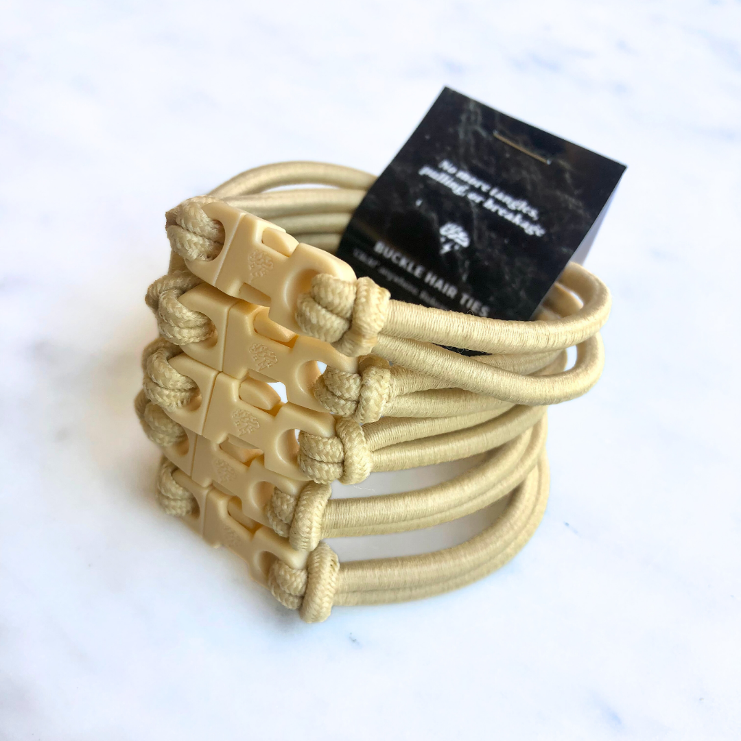 Best hair tie elastics and scrunchie hair accessories for snag-free, pull-free, rip-free, hair. Smooth, effortless hair ties and hair scrunchies for athletes, active moms, fitness, & sports. Buckle Hair Tie Elastics - No Snagging, No Tangles