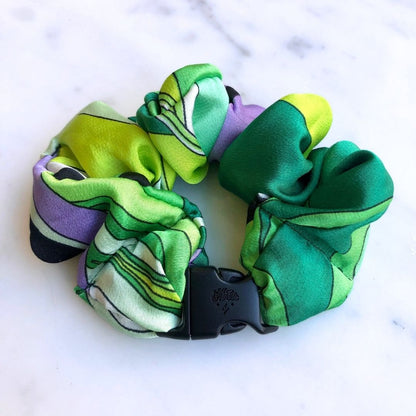 Best zero tangle no pull hair tie elastics and scrunchie hair accessories for snag-free, pull-free, rip-free, hair. Smooth, effortless hair ties and hair scrunchies for athletes, active moms, fitness, & sports. Lucky Green Buckle Scrunchie - No Snagging, No Tangles