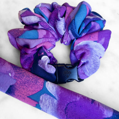 Best zero tangle no pull hair tie elastics and scrunchie hair accessories for snag-free, pull-free, rip-free, hair. Smooth, effortless hair ties and hair scrunchies for athletes, active moms, fitness, & sports. Twilight Garden Purple Floral Buckle Scrunchie - No Snagging, No Tangles