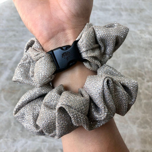 Best hair tie elastics and scrunchie hair accessories for snag-free, pull-free, rip-free, hair. Smooth, effortless hair ties and hair scrunchies for athletes, active moms, fitness, & sports. Sparkling Silver Buckle Scrunchie - No Snagging, No Tangles Sparkling Silver Recycled Polyblend Standard (1-1.25 in. thickness)