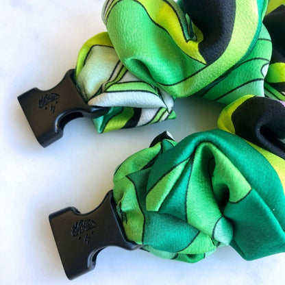 Best zero tangle no pull hair tie elastics and scrunchie hair accessories for snag-free, pull-free, rip-free, hair. Smooth, effortless hair ties and hair scrunchies for athletes, active moms, fitness, & sports. Lucky Green Buckle Scrunchie - No Snagging, No Tangles