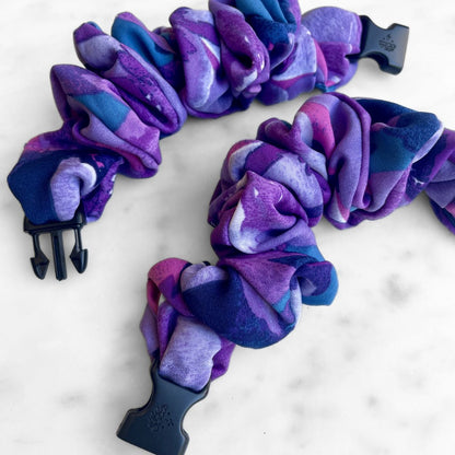 Best zero tangle no pull hair tie elastics and scrunchie hair accessories for snag-free, pull-free, rip-free, hair. Smooth, effortless hair ties and hair scrunchies for athletes, active moms, fitness, & sports. Twilight Garden Purple Floral Buckle Scrunchie - No Snagging, No Tangles