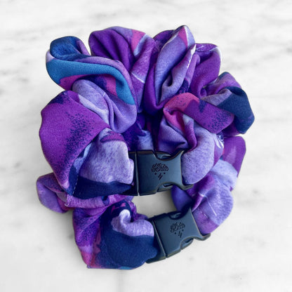 Best zero tangle no pull hair tie elastics and scrunchie hair accessories for snag-free, pull-free, rip-free, hair. Smooth, effortless hair ties and hair scrunchies for athletes, active moms, fitness, & sports. Twilight Garden Purple Floral Buckle Scrunchie - No Snagging, No Tangles