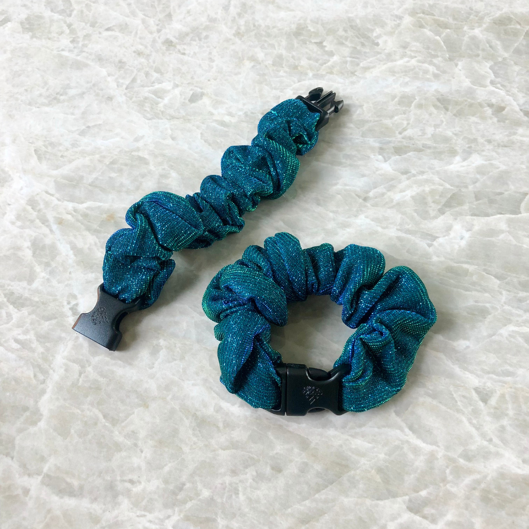 Best hair tie elastics and scrunchie hair accessories for snag-free, pull-free, rip-free, hair. Smooth, effortless hair ties and hair scrunchies for athletes, active moms, fitness, & sports. Mystic Mermaid Teal Buckle Scrunchie - No Snagging, No Tangles
