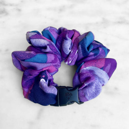Best zero tangle no pull hair tie elastics and scrunchie hair accessories for snag-free, pull-free, rip-free, hair. Smooth, effortless hair ties and hair scrunchies for athletes, active moms, fitness, & sports. Twilight Garden Purple Floral Buckle Scrunchie - No Snagging, No Tangles