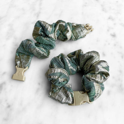 Best zero tangle no pull hair tie elastics and scrunchie hair accessories for snag-free, pull-free, rip-free, hair. Smooth, effortless hair ties and hair scrunchies for athletes, active moms, fitness, & sports. Gilded Sage Buckle Scrunchie - No Snagging, No Tangles Gilded Sage Recycled Plissé