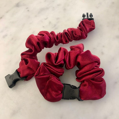 Best zero tangle no pull hair tie elastics and scrunchie hair accessories for snag-free, pull-free, rip-free, hair. Smooth, effortless hair ties and hair scrunchies for athletes, active moms, fitness, & sports. Cherry Red Buckle Scrunchie - No Snagging, No Tangles