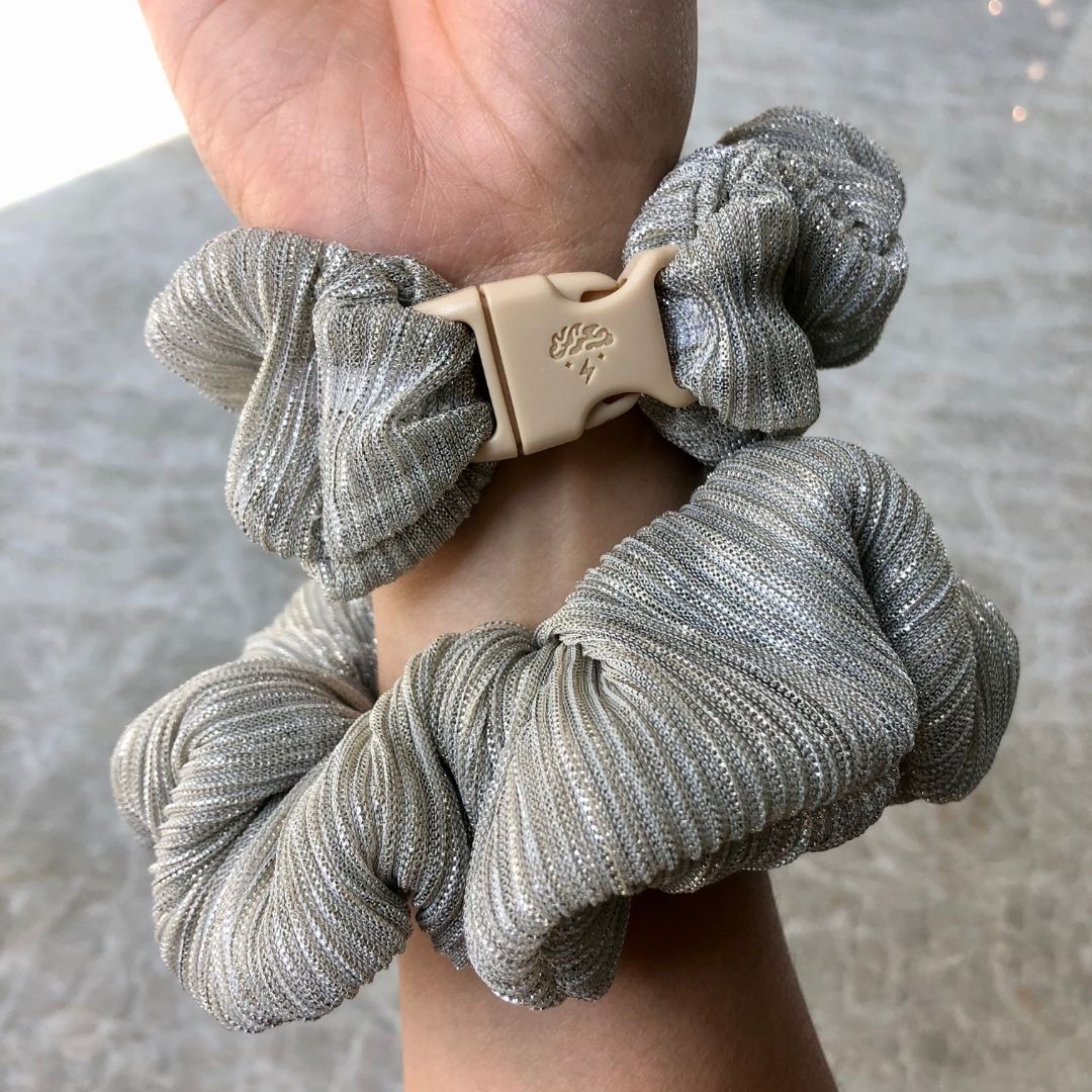 Best hair tie elastics and scrunchie hair accessories for snag-free, pull-free, rip-free, hair. Smooth, effortless hair ties and hair scrunchies for athletes, active moms, fitness, & sports. Tinsel Silver Buckle Scrunchie - No Snagging, No Tangles