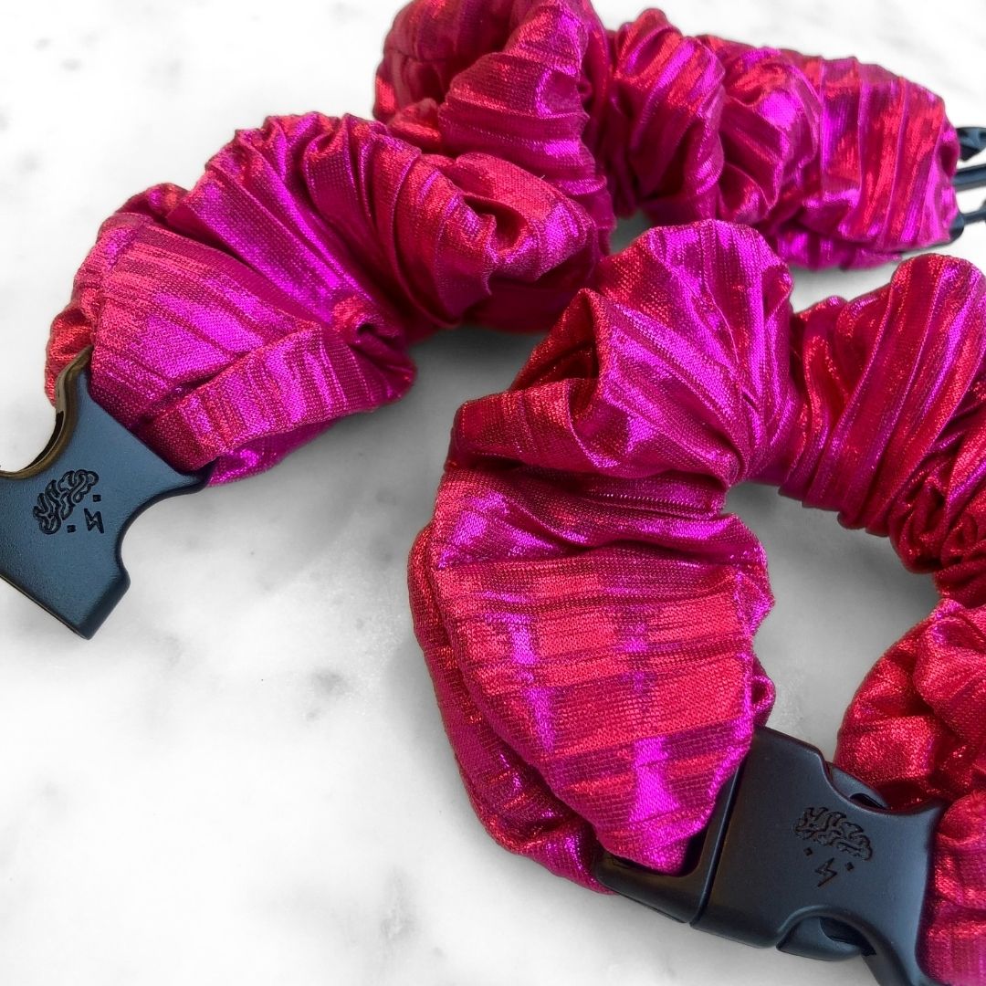 Best hair tie elastics and scrunchie hair accessories for snag-free, pull-free, rip-free, hair. Smooth, effortless hair ties and hair scrunchies for athletes, active moms, fitness, & sports. Metallic Mermaid Magenta Buckle Scrunchie - No Snagging, No Tangles