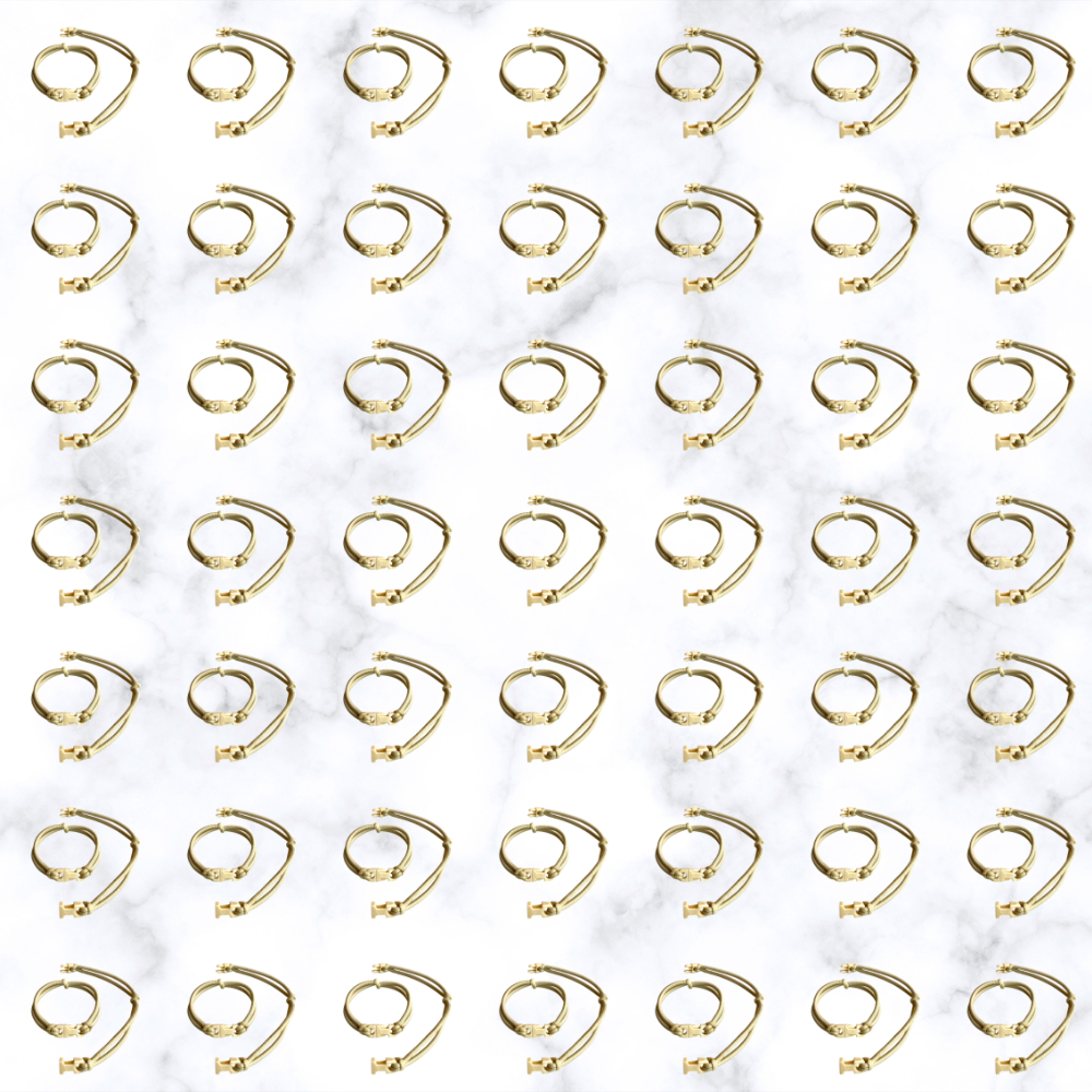 Grid of Champagne Blonde Buckle Hair Tie elastics on marble, 100-pack bulk team pack for gyms, studios, and sports teams