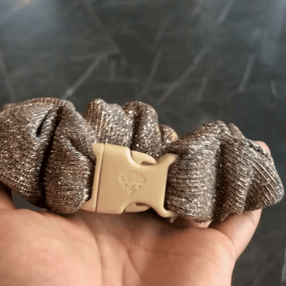 Best zero tangle no pull hair tie elastics and scrunchie hair accessories for snag-free, pull-free, rip-free, hair. Smooth, effortless hair ties and hair scrunchies for athletes, active moms, fitness, & sports. Champagne Glitter Buckle Scrunchie - No Snagging, No Tangles Champagne Glitter Recycled Polyblend Standard (1.25 to 1.5 inch thickness)
