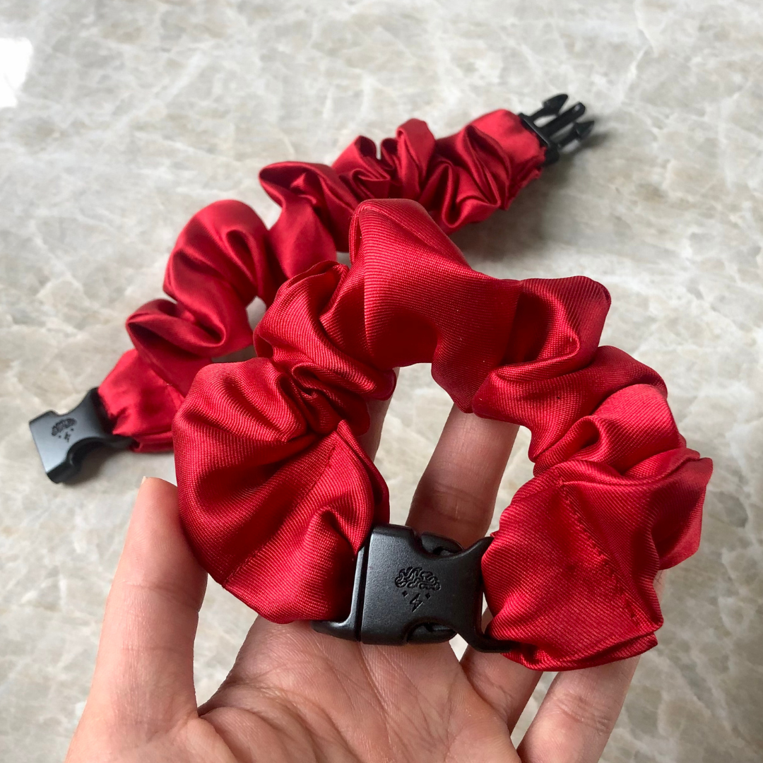 Best hair tie elastics and scrunchie hair accessories for snag-free, pull-free, rip-free, hair. Smooth, effortless hair ties and hair scrunchies for athletes, active moms, fitness, & sports. Buckle Scrunchie - Vibrant Solid Colors - No Snagging, No Tangles Firecracker Red Recycled Satin Standard (1.25 to 1.5 inch thickness)