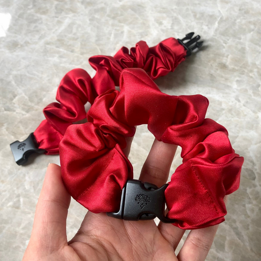 Best hair tie elastics and scrunchie hair accessories for snag-free, pull-free, rip-free, hair. Smooth, effortless hair ties and hair scrunchies for athletes, active moms, fitness, & sports. Buckle Scrunchie - Vibrant Solid Colors - No Snagging, No Tangles Firecracker Red Recycled Satin Standard (1.25 to 1.5 inch thickness)