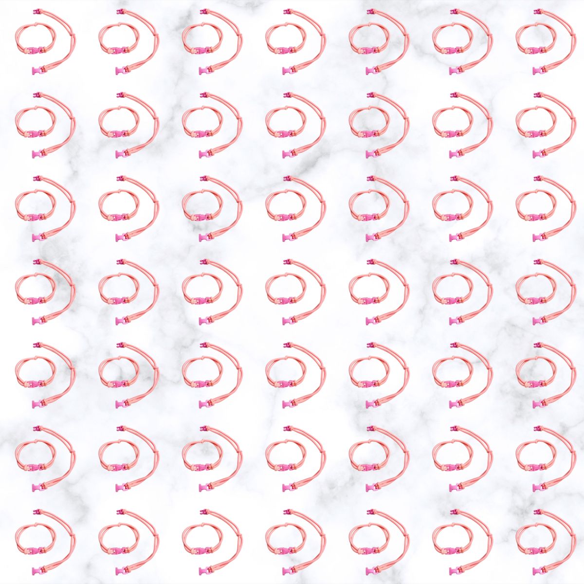 Grid of Baby Pink Buckle Hair Tie elastics on marble, 100 pack for cheer, volleyball, and Pink Out games