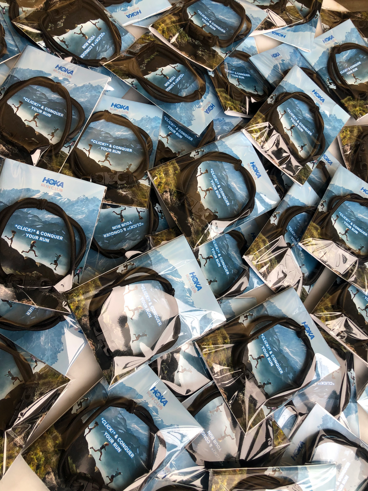 Pile of packaged Buckle Hair Ties in mixed colors