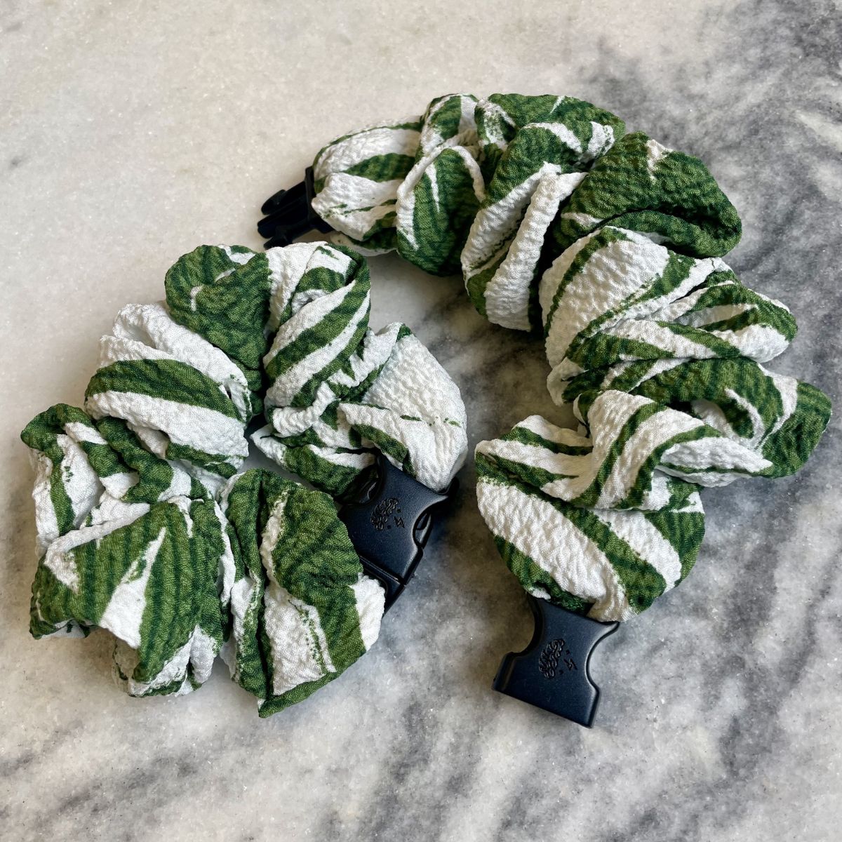 Green foliage print Buckle Scrunchie shown from above