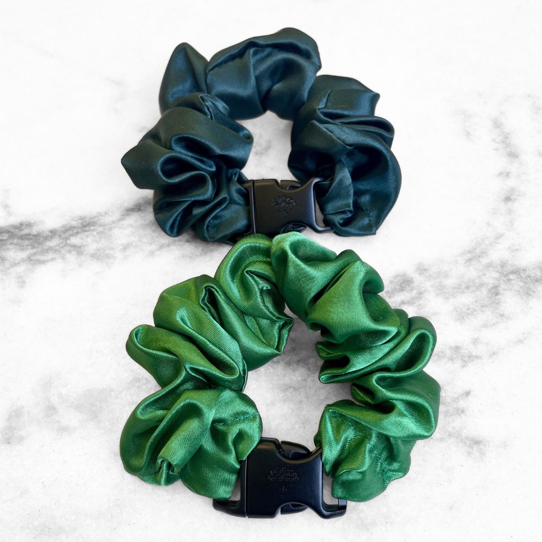 Two green satin Buckle Scrunchies paired for St. Patrick's Day
