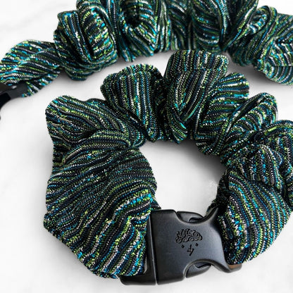 Teal and green stripe fabric detail on the Peacock Buckle Scrunchie