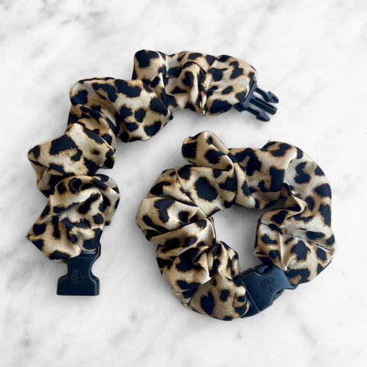 Prowl Leopard Buckle Scrunchie in a brown and black leopard print