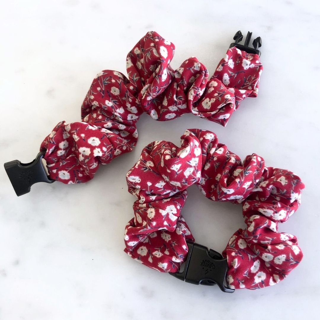 Ruby red floral print fabric detail on the Buckle Scrunchie