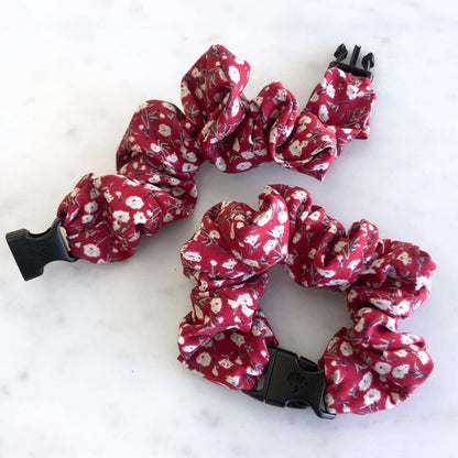 Ruby red floral print fabric detail on the Buckle Scrunchie