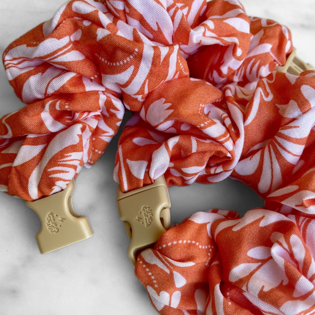 Valencia Orange jumbo Buckle Scrunchie, snag-free hold for thick and curly hair