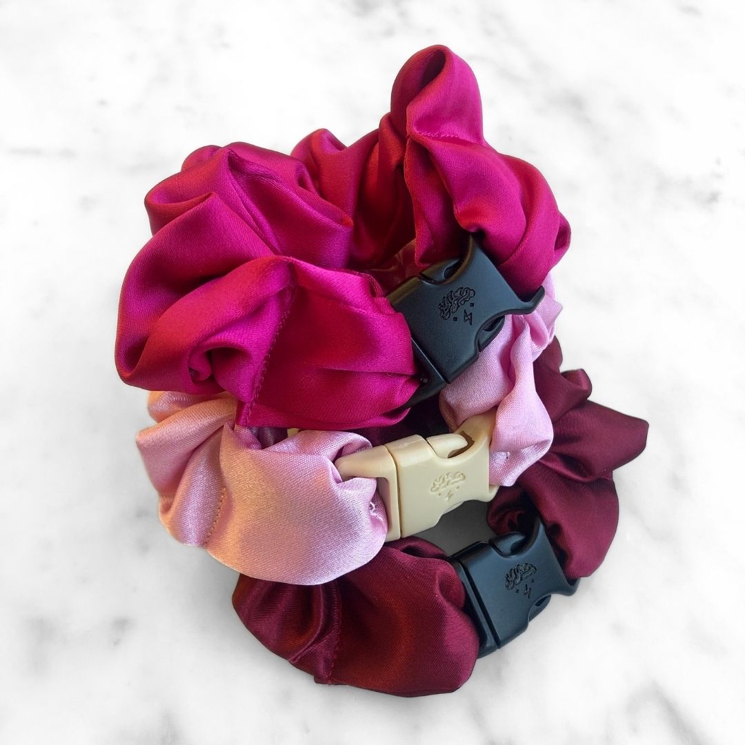 Three Valentine's Buckle Scrunchies in red, pink, and white satin