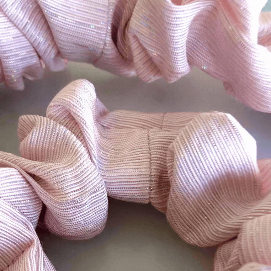 Best hair tie elastics and scrunchie hair accessories for snag-free, pull-free, rip-free, hair. Smooth, effortless hair ties and hair scrunchies for athletes, active moms, fitness, & sports. Candy Floss Pink Buckle Scrunchie - No Snagging, No Tangles
